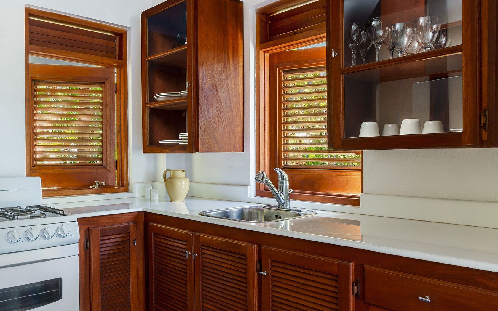 Bungalow kitchen with warm wooden cabinetry